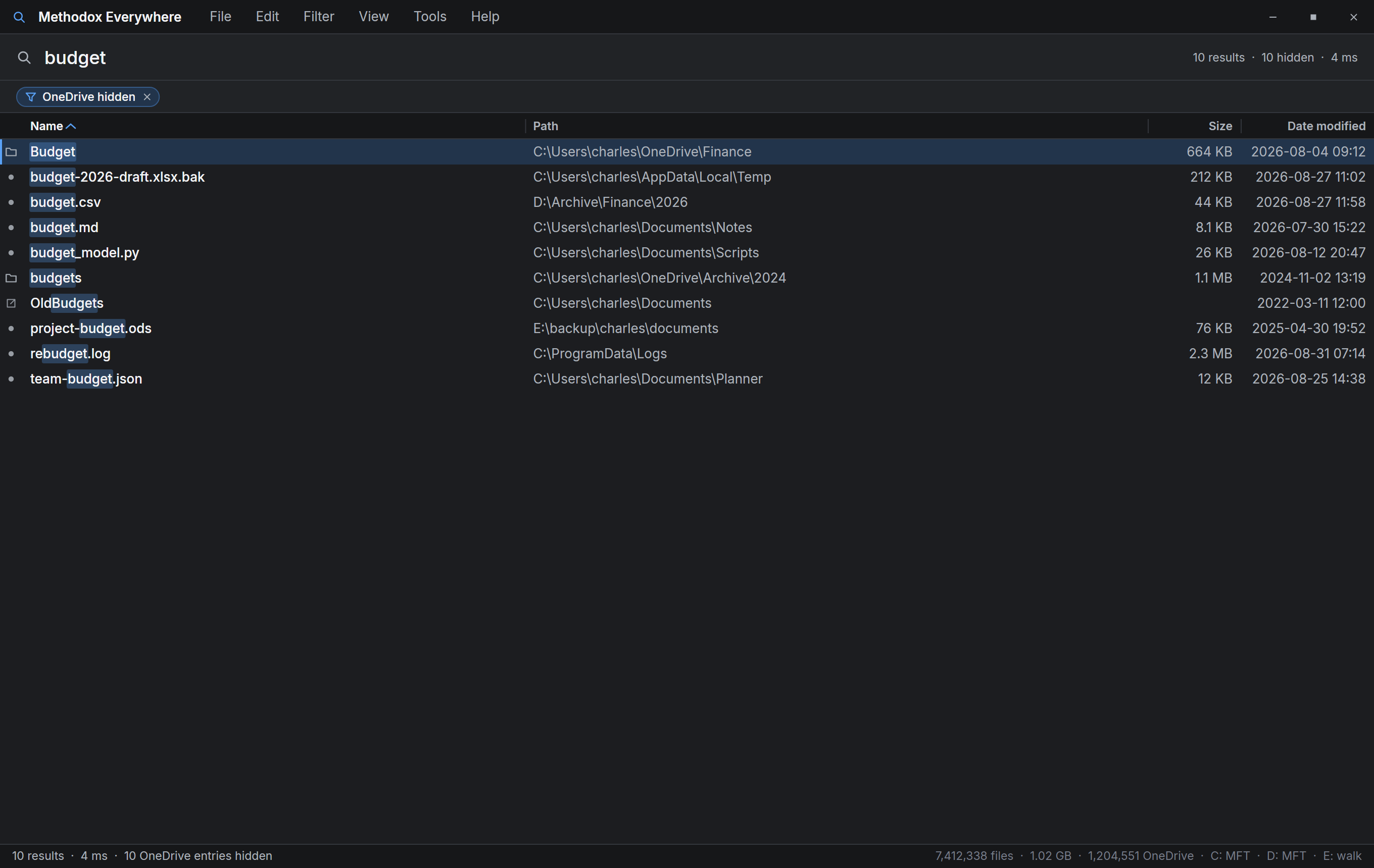 The same search with cloud-only files hidden, and a removable chip under the search box saying so.